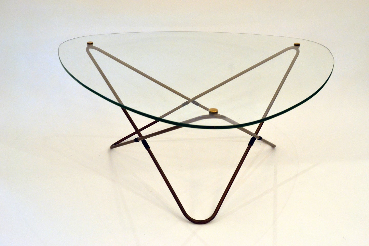The "Atomic" Mid Century Triangular Coffee Table by Pierre Guariche