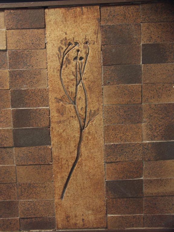 A Tile Top Low Table by Roger Capron