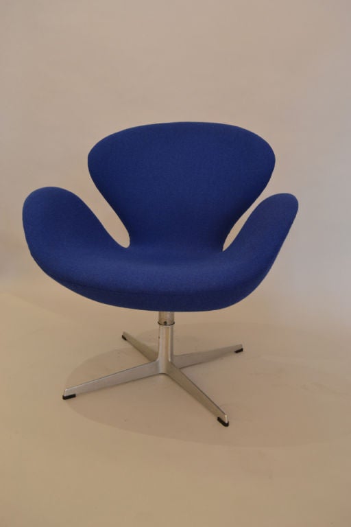 Rare Tilt and Height Adjustment Pair of Swan Chairs