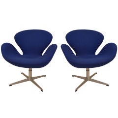 Rare Tilt and Height Adjustment Pair of Swan Chairs