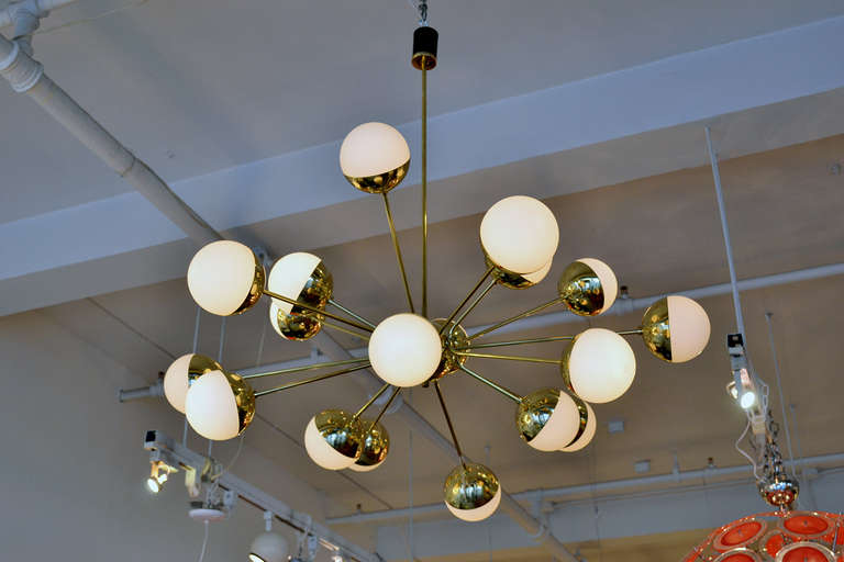 An Italian sputnik style chandelier with frosted glass globes.