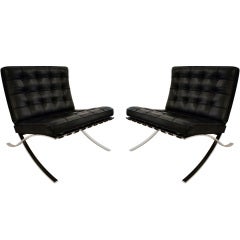 Pair of Barcelona Chairs and Ottoman