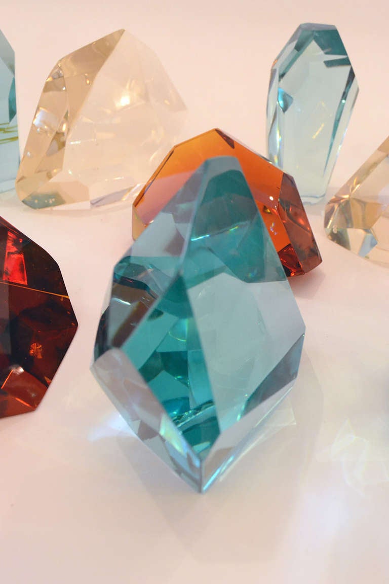 An extraordinary collection of slag glass that has been cut and polished by the contemporary Italian glass artist Ghiro. The pieces are in a variety of shapes and sizes. Each piece is signed Ghiro. The pieces are available individually priced from