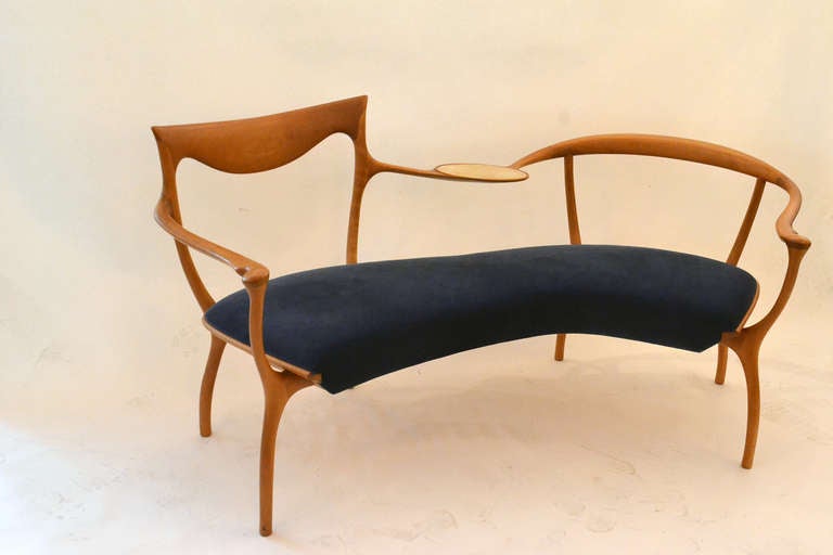 A skillfully and well designed settee manufactured by Ceccotti Collezioni, Italy. Designed by Roberto Lazzeroni. The settee is elegantly thoughtful and fits into Lazzeroni's own personal ideology of what he terms as 