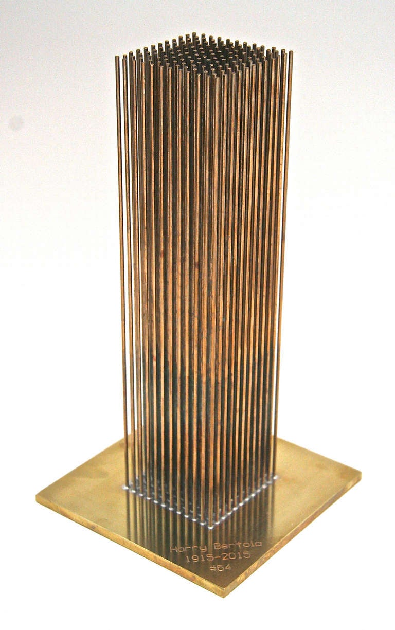 Originally designed by Harry Bertoia in 1970 this sonambient sculpture is #64 of a limited edition of 100 reproductions authorized by the Bertoia Estate and Bertoia Studio. The rods are bronze and silvered to a brass base and have a wonderful