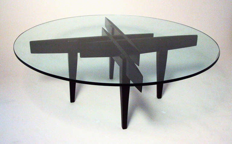 A remarkable table designed by Gio Ponti. The geometric form of the table is a reoccurring design by Ponti for many of his architectural and interior installations. The table was purchased directly from a close relative of the family and is