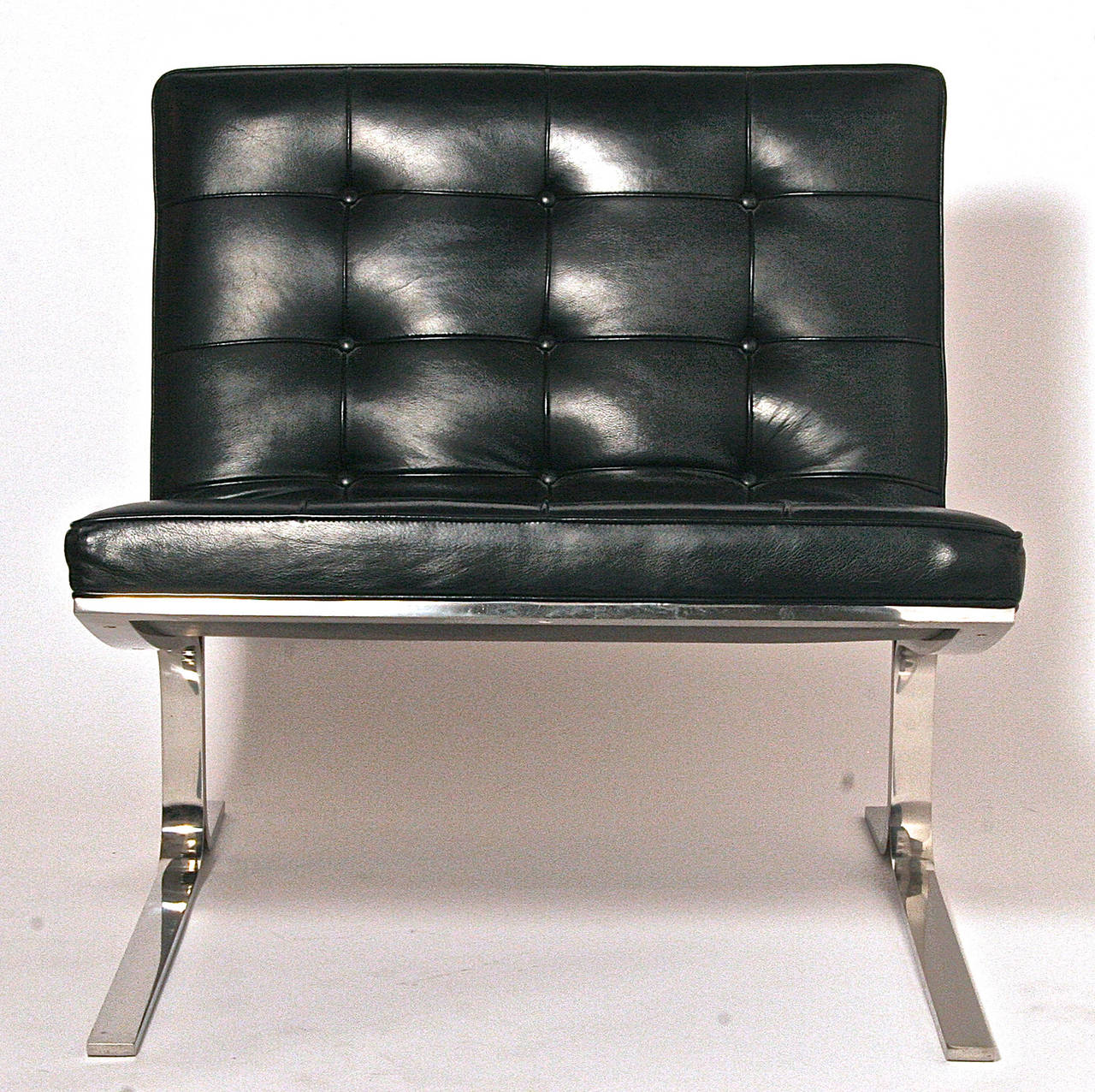 Pair of Nicos Zographos Black Leather Lounge Chairs In Excellent Condition In New York, NY