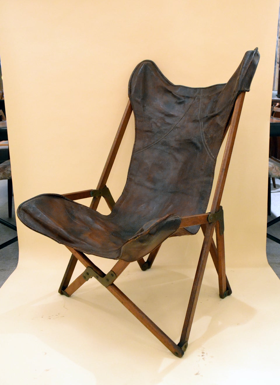 Wonderfully Distressed Leather Campaign Chair