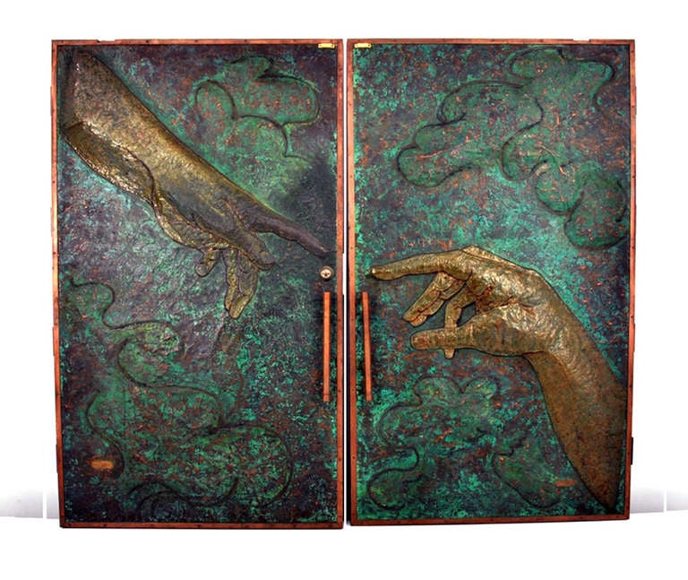 Un ensemble pictural et métaphoriquement descriptif de portes en bronze réalisées par Roy Butler. Les portes proviennent d'un domaine de Boca Raton:: en Floride. Les portes ont été conçues par Roy Butler:: un artisan du métal de la région de Miami::