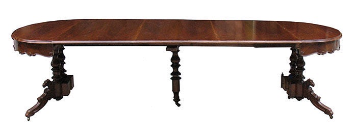 Oak German 1840's oval dining extension table with 3 leaves