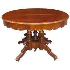 Antique German 1840's oval dining extension table with 3 leaves