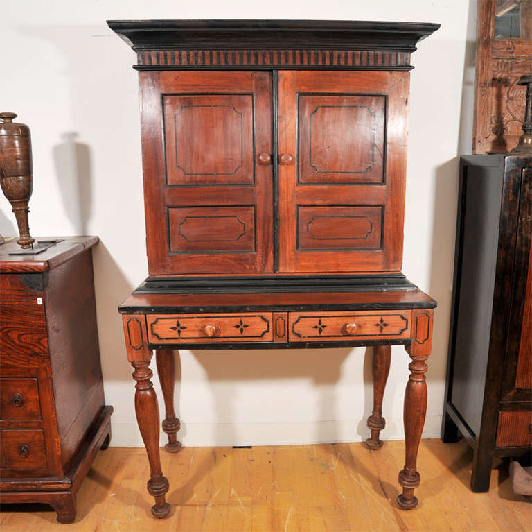 Beautiful colonial credenza desk with two drawers and cabinet hutch.  Featuring ebony details and piping and carved legs.  Originally priced at $2750.