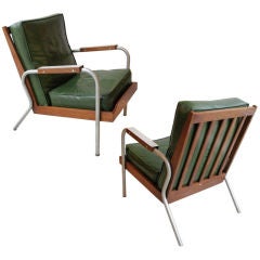 Pair of American armchairs in the manner of " Prouve"