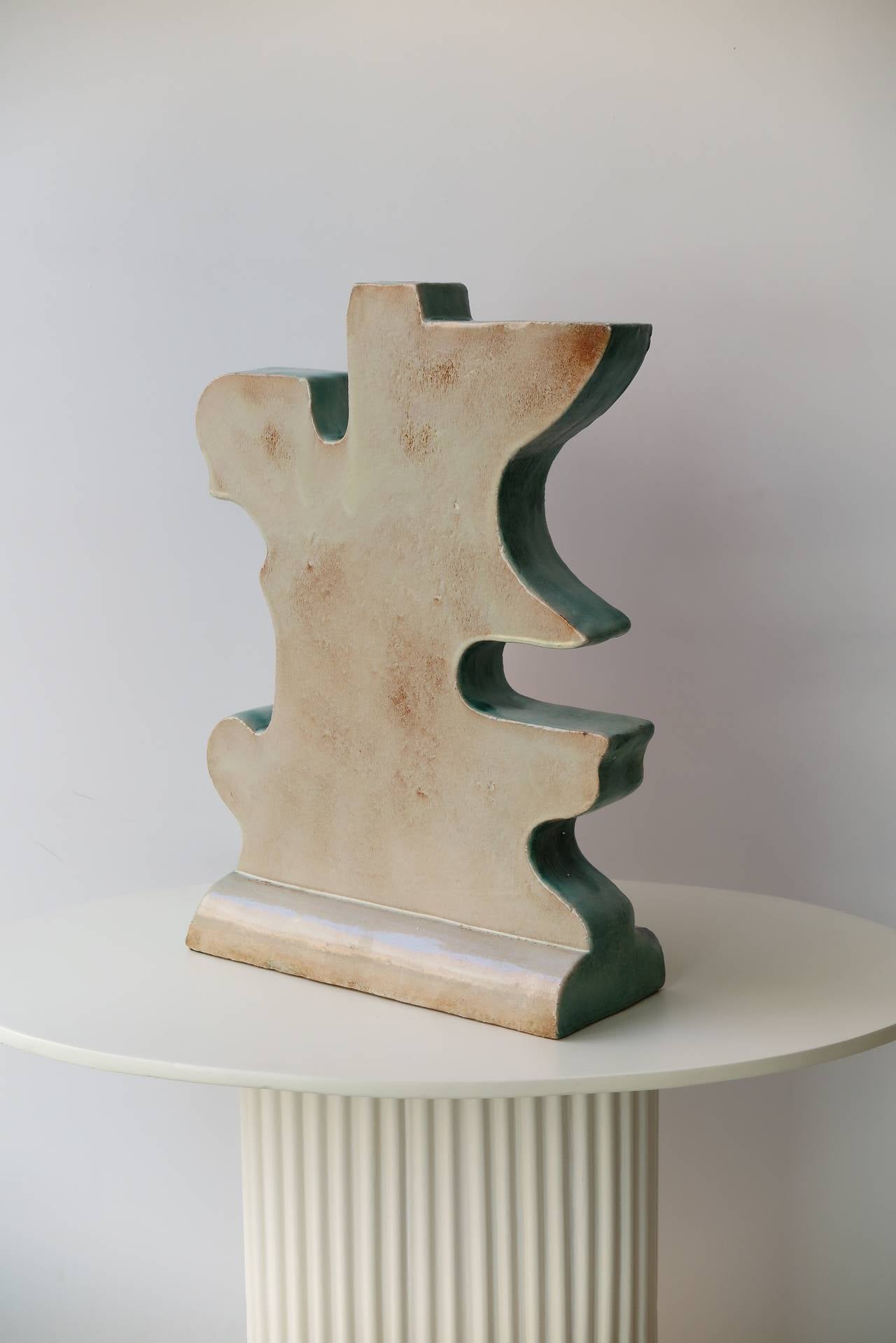An important unique studio sculpture in ceramic, double faced with blue and cream shades and green borders by Marcello Fantoni, Italy, (1915-2011), 1959. Signed Fantoni 59. Could also be used as a table lamp.
Provenance: From an Italian collector.