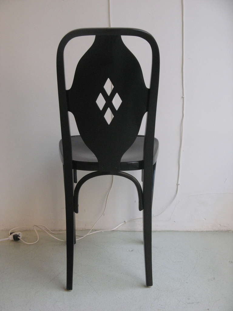 Set of 8 dining chairs in ebonized beech wood designed by Carl Witzmann, manufactured by J. & J. Kohn, Vienna, ca. 1908.  Carl Witzmann (1883 - 1952) was an Architect and a student of Josef Hoffmann.  He worked closely with the Wiener Werkstätte.