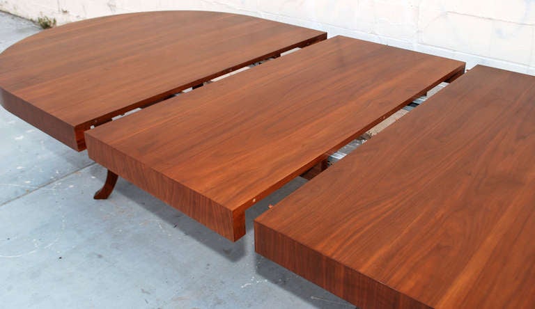 American Expanding Walnut Dining Table of Midcentury Design For Sale