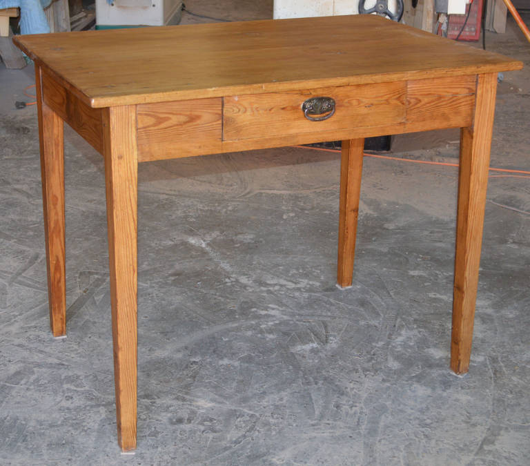 Classic country table with a single drawer. Unlike many older tables, this one offers ample leg room and a 31" table height. Great original drawer pull and lock. 