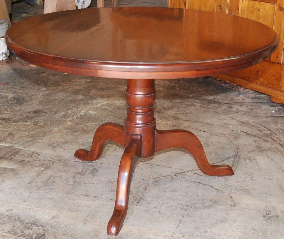 Round black walnut table, newly restored. Shows nice patina.
