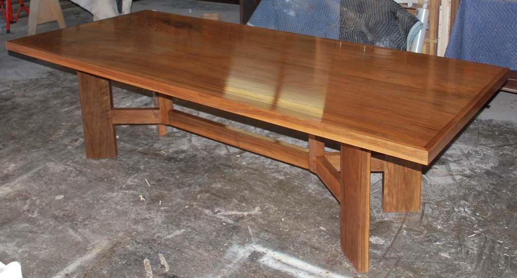 This modern dining table is made from vintage, book-matched, black walnut sister flitches with beautiful figuring and flame. 

Because each table is bench-made in our own Los Angeles workshop you can influence all aspects of design, including size,