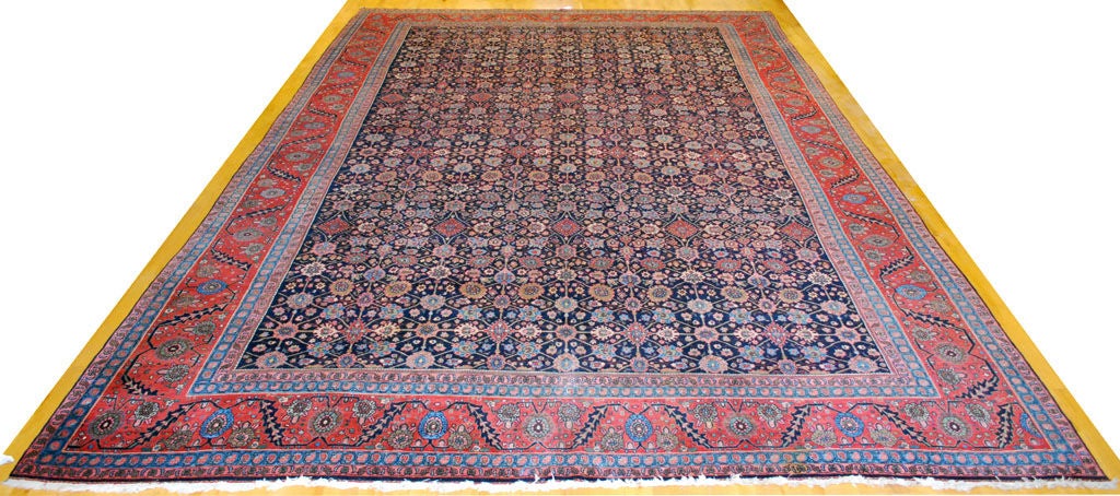 Wonderful Persian Bejar (Bidjar or Bijar) with an overall geometrically floral design on dark blue ground, rust colored border with powder blue framing. In excellent condition!

Please call for additional high-resolution images.