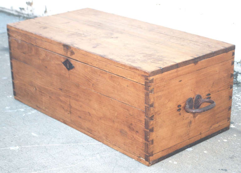 Late 19th Century chest. The interior is divided into fifty slots perfectly sized to hold most red or white wine bottles. Even many over-sized wines and Champagnes can be accommodated.

Note the heavy duty handles and dove-tailed corners designed