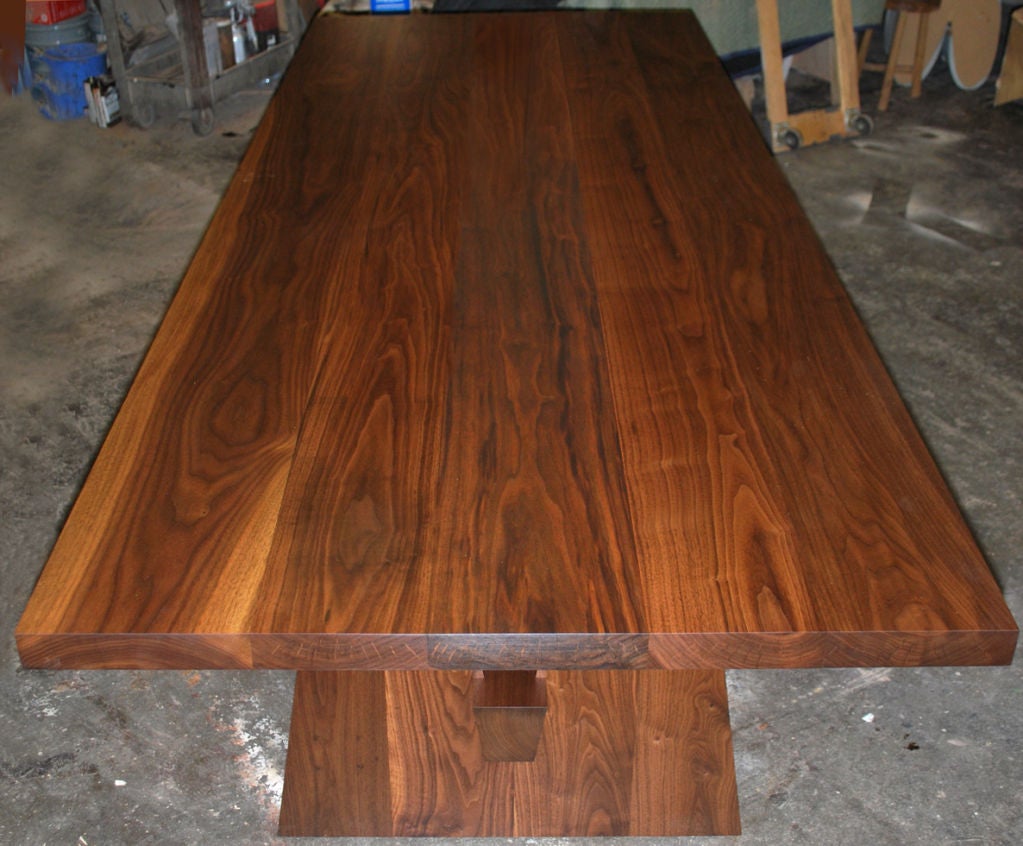 This custom dining table is made in solid Eastern Black Walnut. It is made from carefully selected boards, free from knots, with matching grain. This table is fully collapsible and can be assembled, without the need for tools, in 2 minutes! 
The