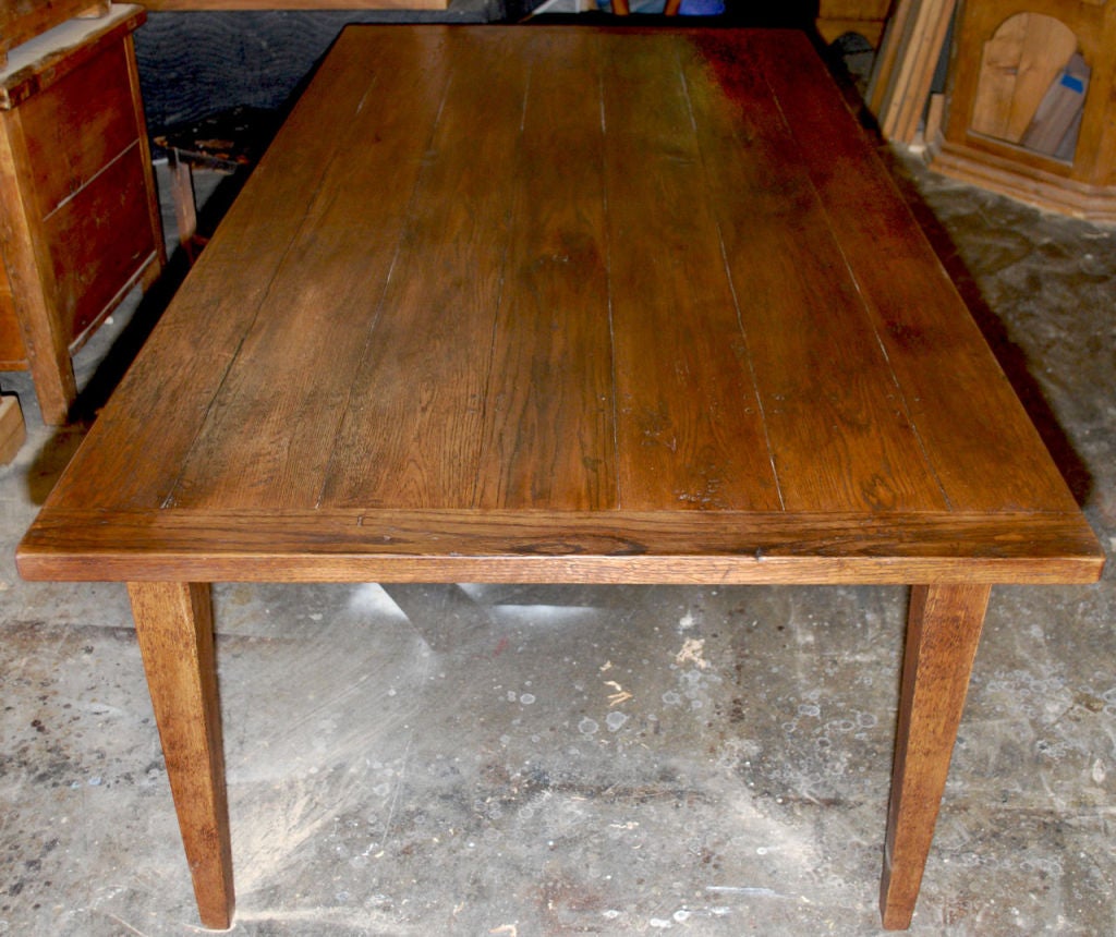This farm table is made from vintage white oak and has optional extension leaves. It is seen here in 42