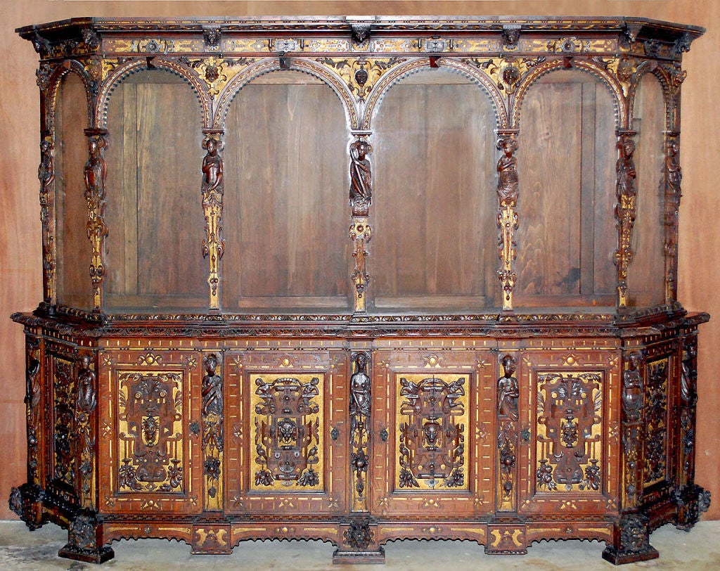 Stunningly beautiful masterpiece in white oak with superb carvings and detail. Note the 14 carved figures, lion's heads and other superbly carved adornments. 