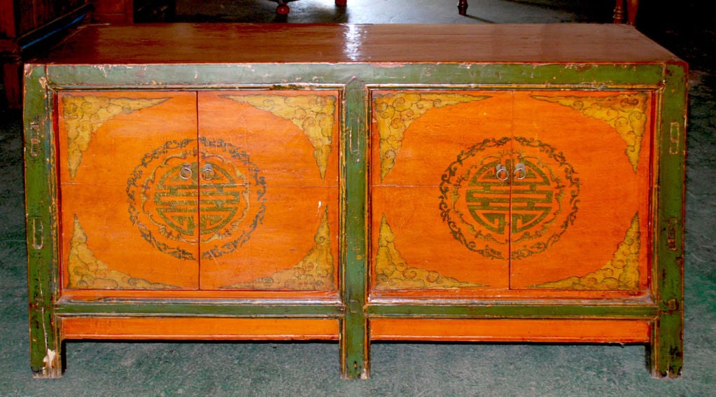19th Century Chinese sideboard with four doors and two interior shelves. Great patina!