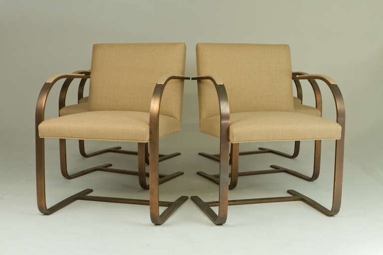 Beautiful patina on this set of Mies van der Rohe Brno chairs in uncommon bronze.  Wear as to be expected for vintage chairs.  Newly upholstered.