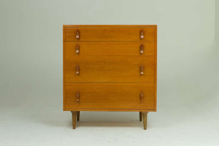 Walnut dresser with aluminum and bent walnut pulls by Stanley Young