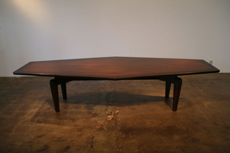 Gorgeous sculptural walnut and mahogany dining table by Monteverdi-Young that is 10 1/2 feet long.  Could be used as a conference table as well. Photos 8-10 show the form of the table, prior to it being refinished.