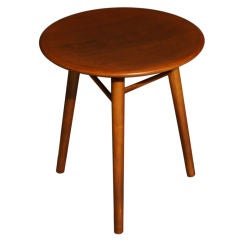 A Dunbar three legged round side table