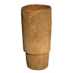 Cylindrical earthenware vessel by Stan Bitters