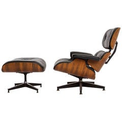 Eames Lounge and Ottoman in Rosewood and Black Leather for Herman Miller
