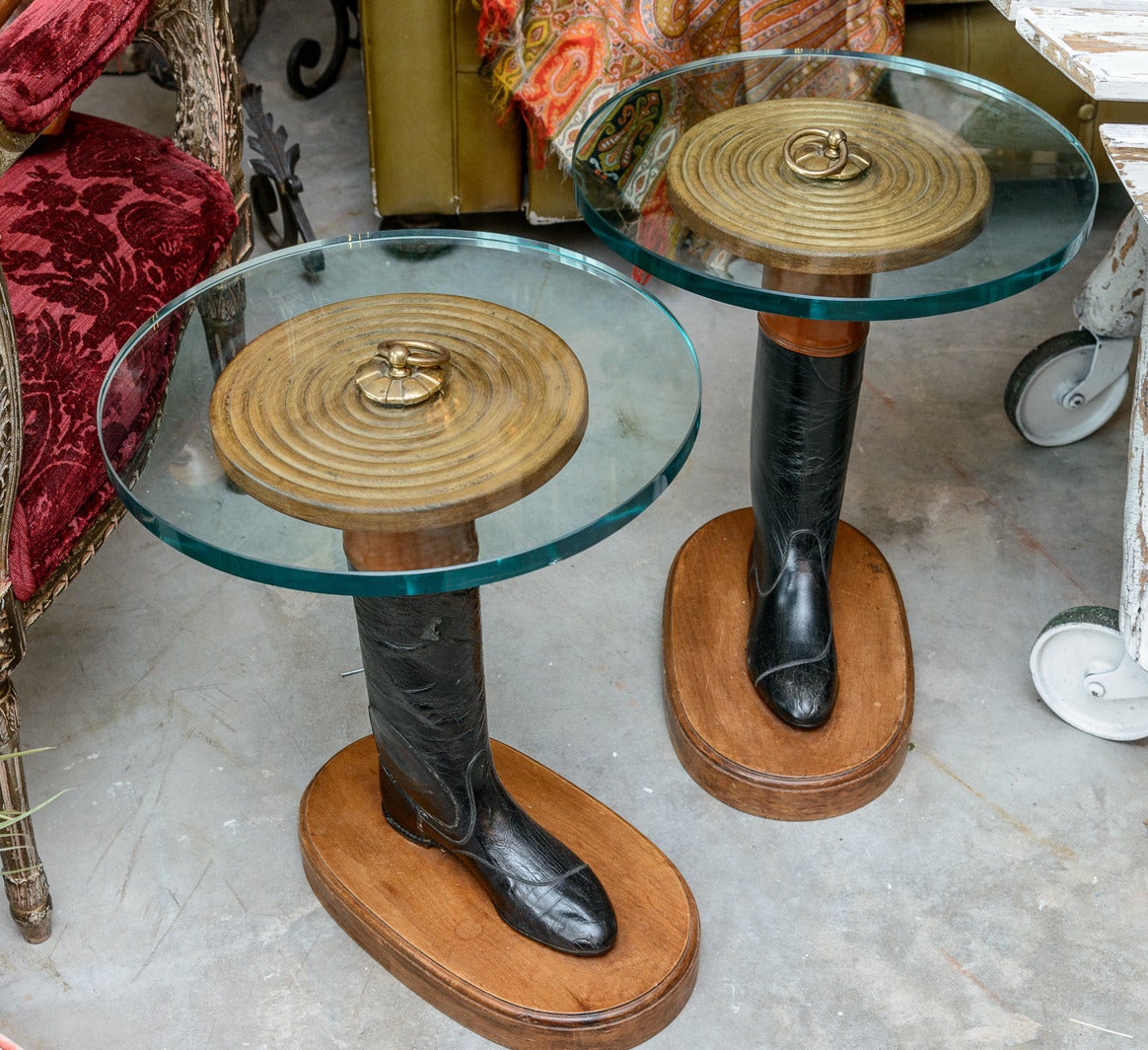 Two carved and painted wooden side tables. Bronze base supporting the circular glass top.