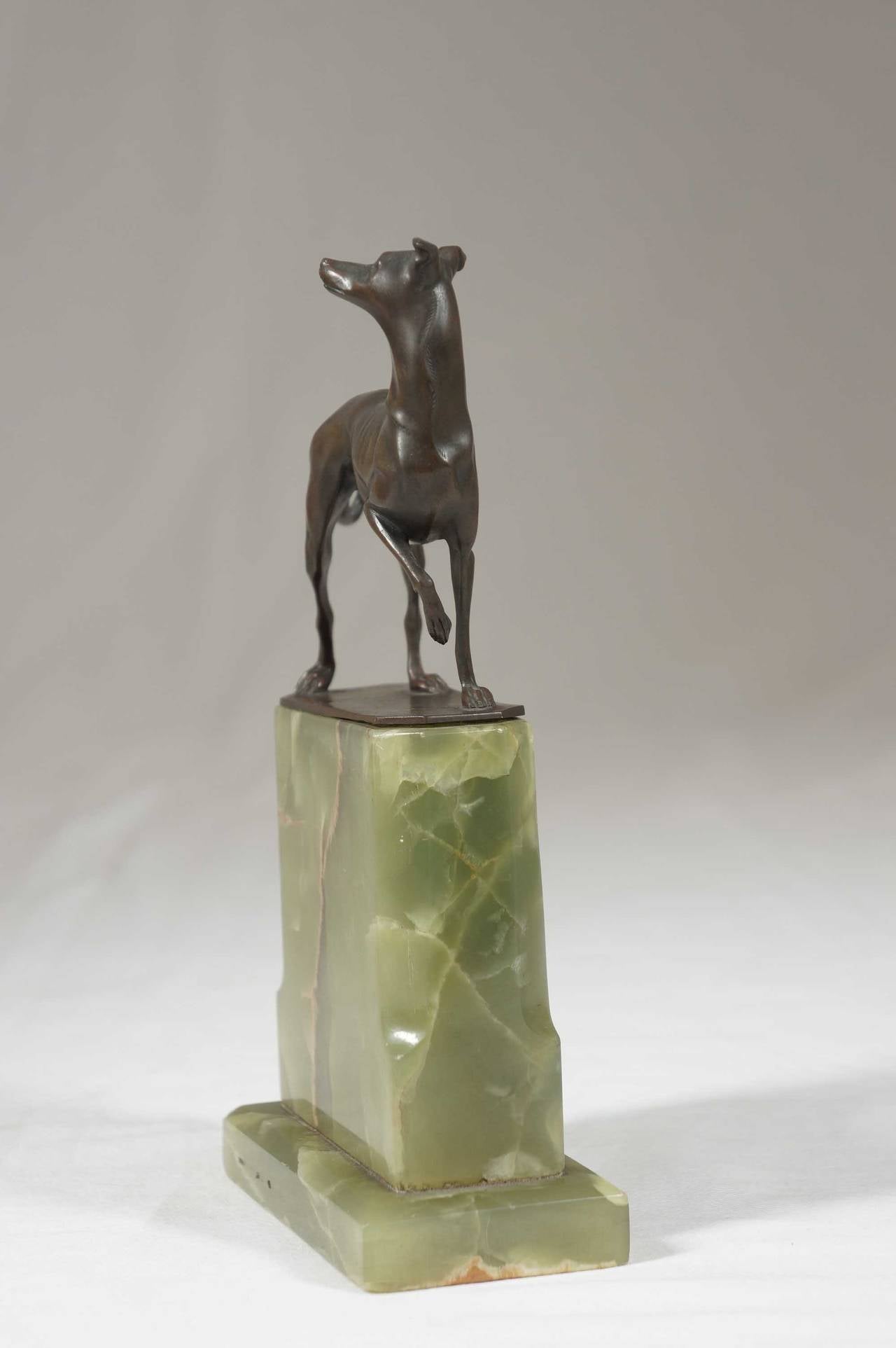 Graceful bronze figure of a greyhound dog, with beautiful onyx marble base.