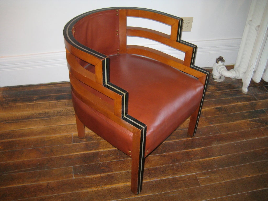 Gorgeous, sturdy, mysterious lacquered wood and leather upholstered chair attributed from everyone from Frank Lloyd Wright to Kem Weber... but unknown. Super-comfortable seat, soft leather with dome brass tacks, and an unusual 