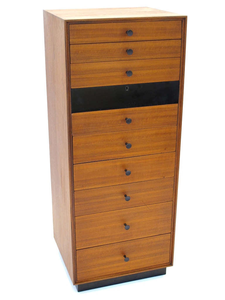 Rare 10-drawer mahogany lingerie chest designed by Kipp Stewart and Stewart MacDougall for Glenn of California. Lacquered black drawer with lock.