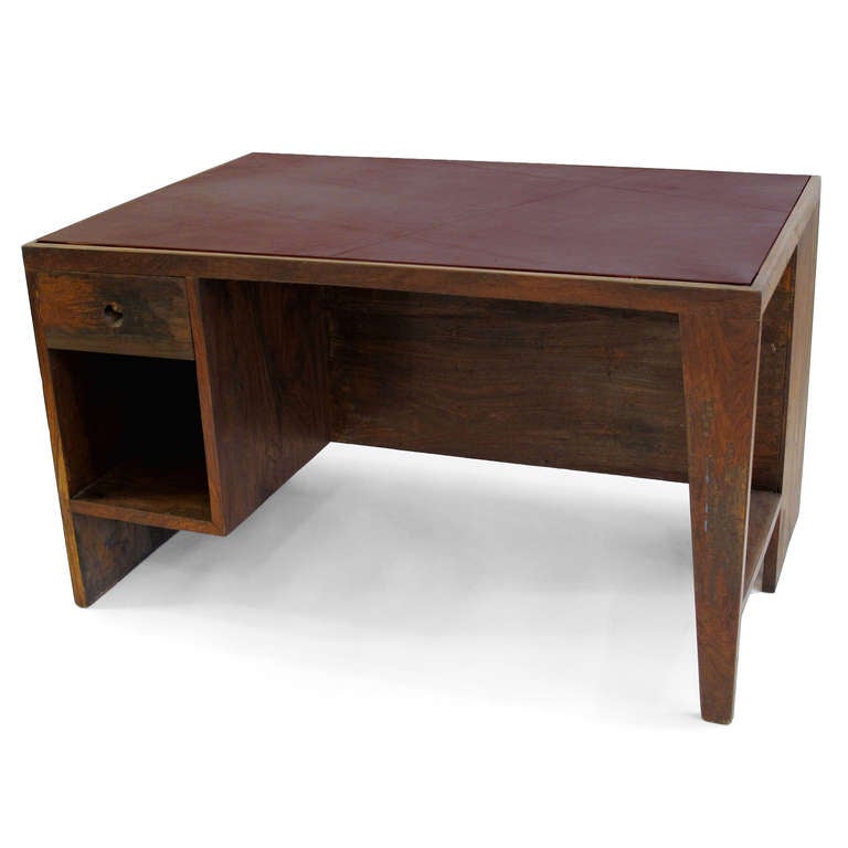 Very rare solid teak desk with leather top, side drawer and front storage cubes from the famous modernist capital city of Chandigarh, which was entirely designed by Le Corbusier and Jeanneret.