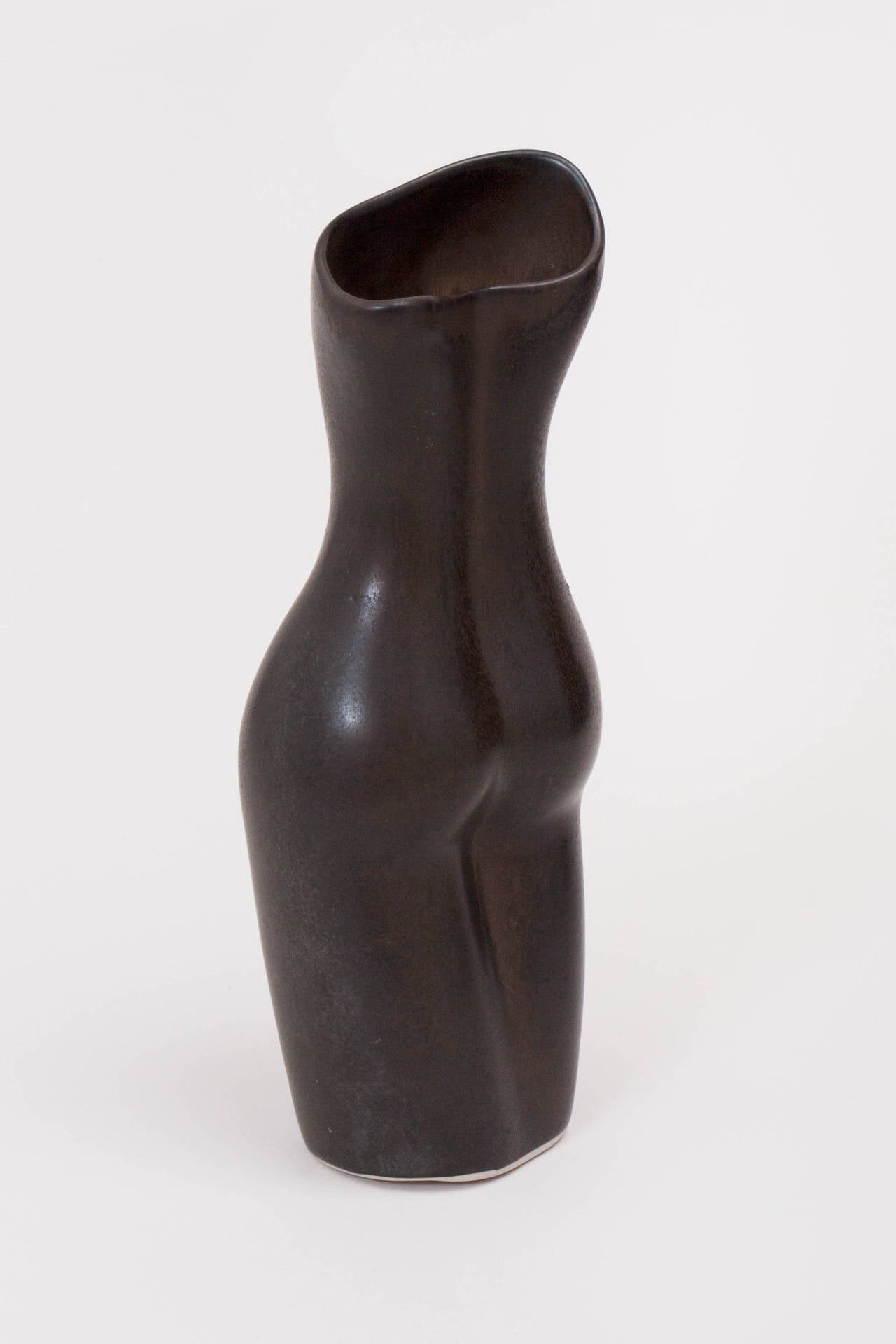 Elegant female-form ceramic vase with espresso colored glaze. Illegibly signed on bottom.