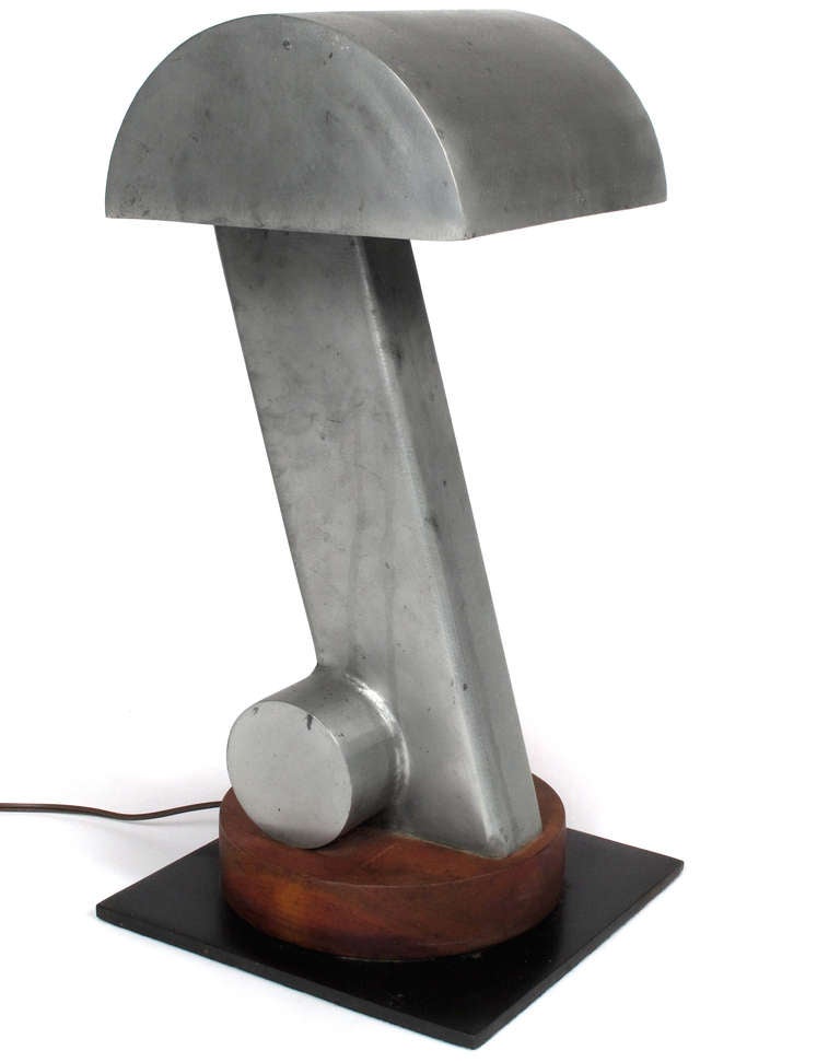 Monumental and very unusual steel and wood lamp by an unknown New York City artist/designer.
