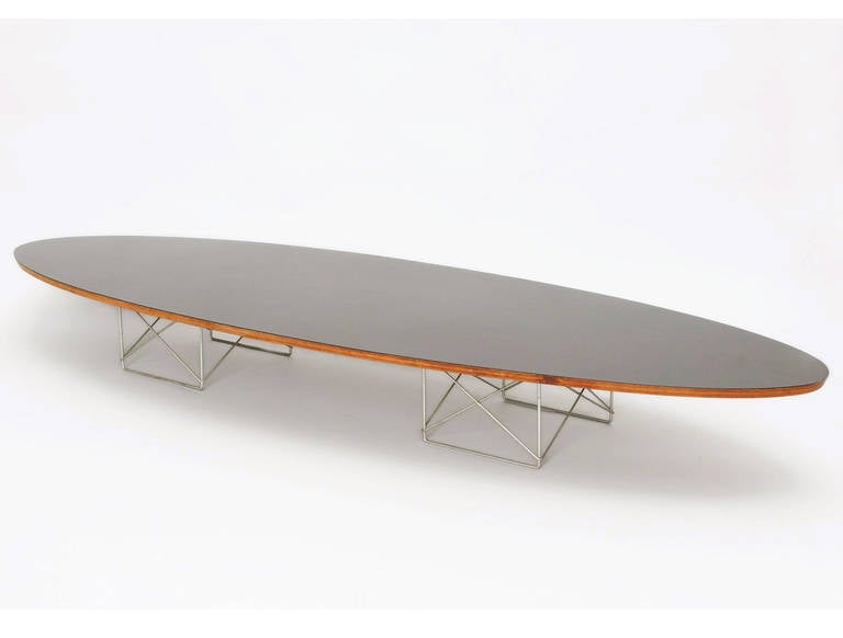 Rare long and low cocktail table for Herman Miller by the husband and wife design team of Charles and Ray Eames. Signed with the aluminum label.