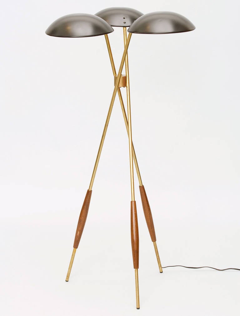 Rare mushroom shade tripod floor lamp in brass, wood, and lacquered steel from the Lightolier Company of New Jersey.