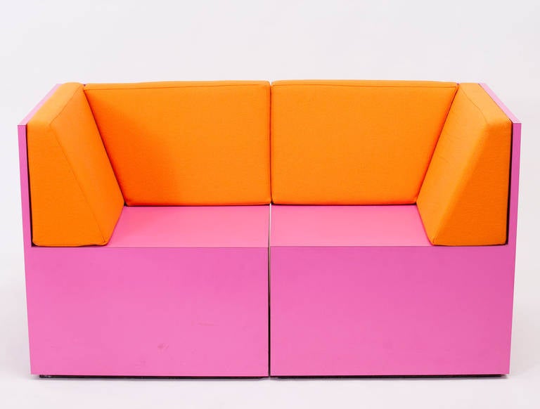 Pink laminate and orange felt chairs by the now defunct Minneapolis based studio ROLU.

Pair of chairs from 