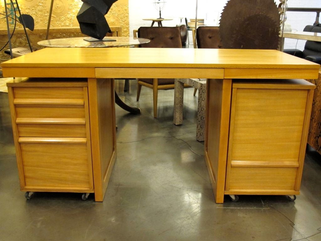 Rare Edward Wormley for Drexel partners desk with 2 rolling file cabinets, drawers, cubby holes, and pop-up writing or typing surfaces.