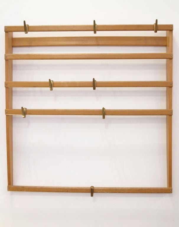 Beautiful and sculptural 8 hook coat rack from the Austrian master. The hooks are adjustable so you can curate your coat pile!