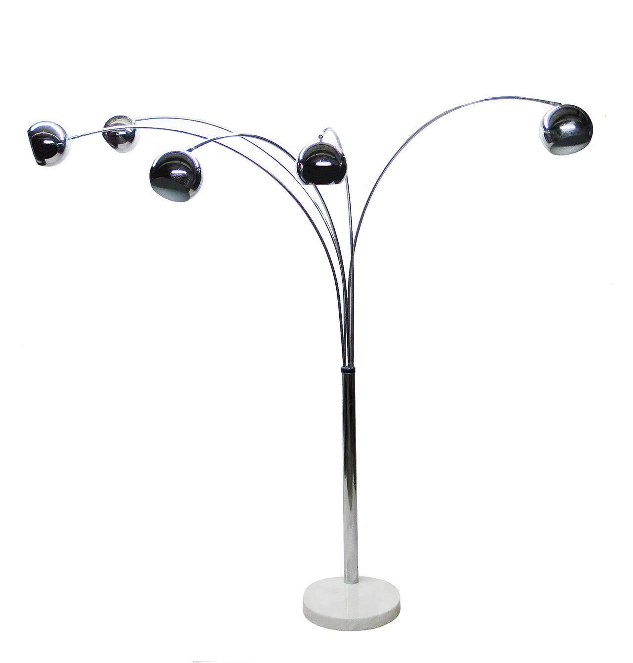 Floor lamp in chrome-plated steel with five, articulating, ball shades each attached to an arched tubular arm that swings 360 degrees allowing all five arms to be placed in various positions. The lamp has a heavy round marble base at the bottom
