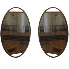 Pair of Small Articulating Oval Mirrors