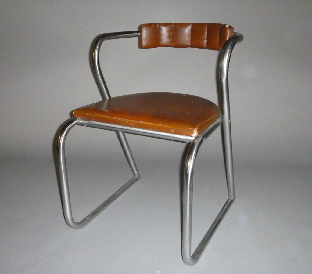 Desk chair in chrome and leather, attributed to Gilbert Rohde.